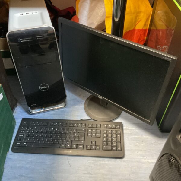 Dell Intel Core i3 computer set with monitor and keyboard.