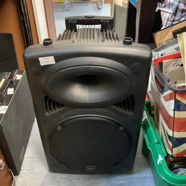 Black Qtx portable PA speaker for events and public address.