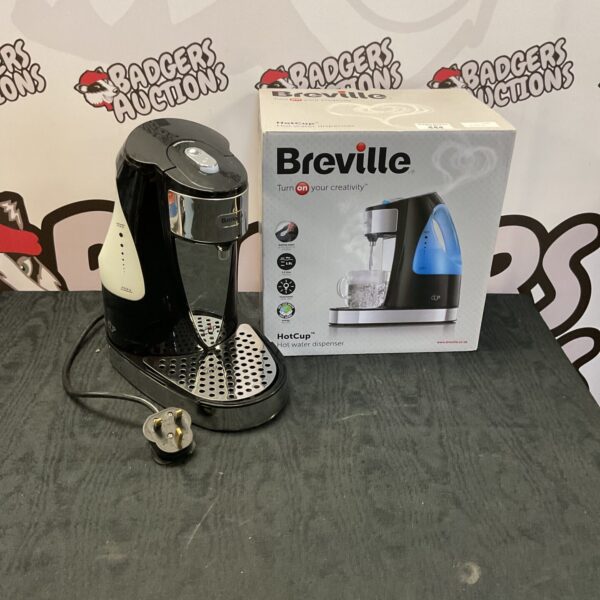 Breville Hot Cup hot water dispenser on a patterned background.