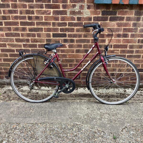 Vintage purple Ludo comfort bike, classic step-through frame.