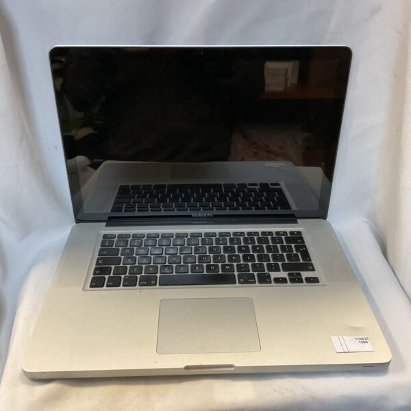 Silver Apple MacBook Pro laptop, vintage computer for sale.