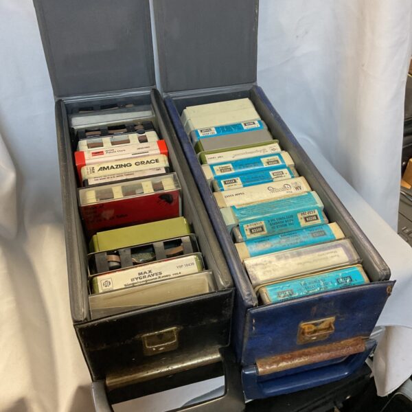 Vintage 8 track cassette lot with two cases of tapes.