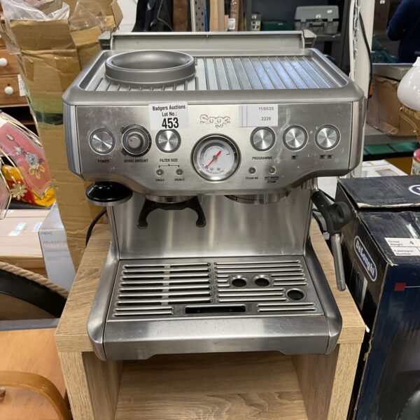 Silver Sage Nespresso coffee machine for home brewing.