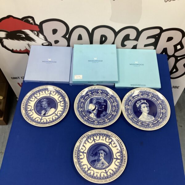 Lot of four Wedgwood Royal collectable plates.