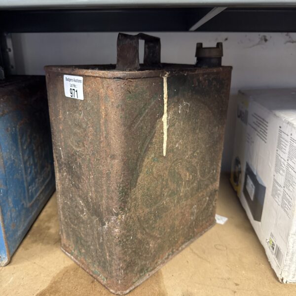 Vintage Esso fuel can showing signs of age and wear.