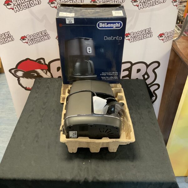 Delonghi Dolce Gusto coffee machine for home brewing.