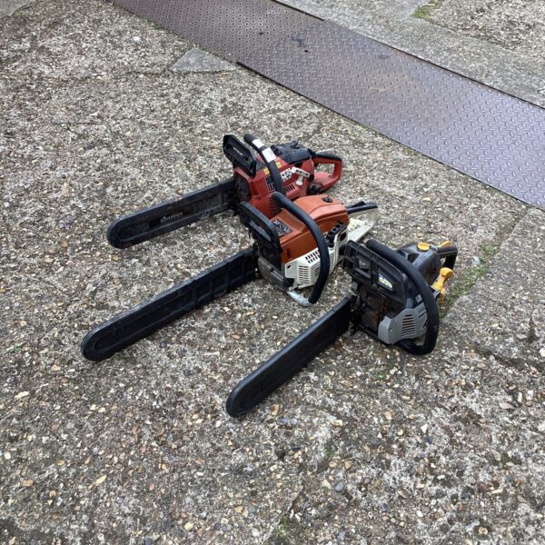 Used petrol chainsaw for garden and landscaping, a robust power tool.