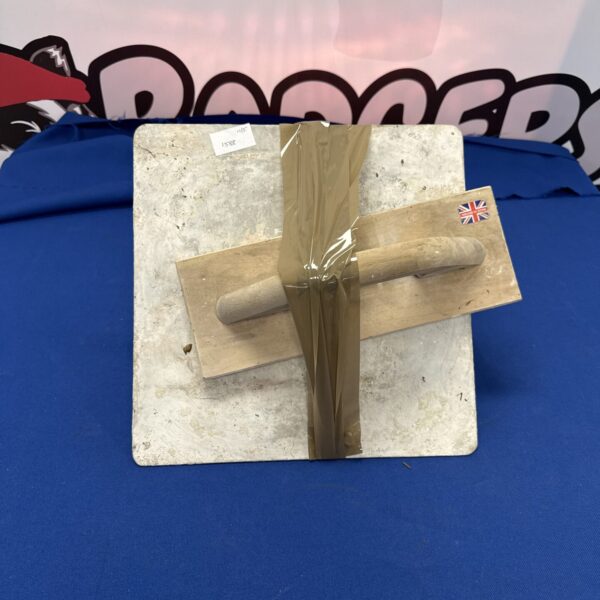 Used plasterers skimmer tool for applying plaster to walls.