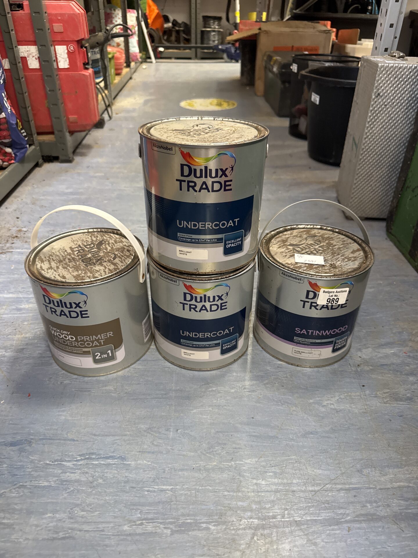 989 Four tins of dulux trade paint – feel full