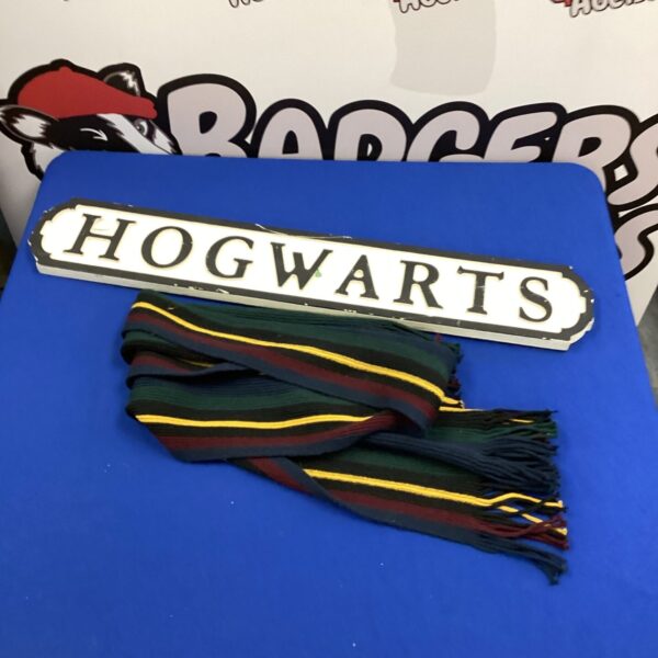 Hogwarts street sign and scarf set, Harry Potter collectible.