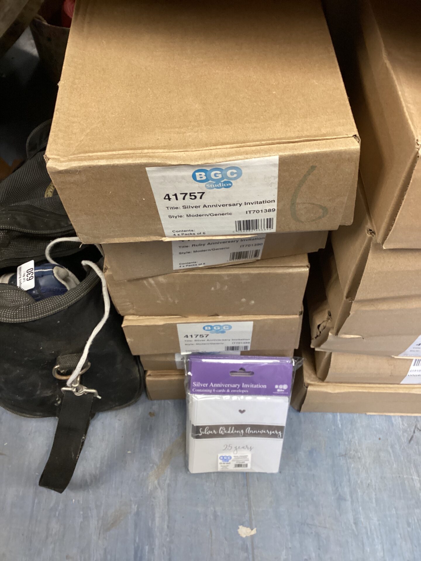 562 Six boxes of silver anniversary invitation packs
