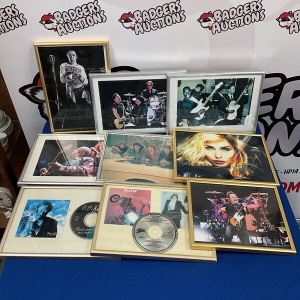 Lot of nine framed rock star photographic prints.