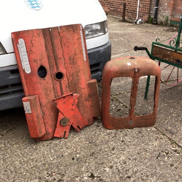 Vintage tractor grill section, showing signs of wear and rust.