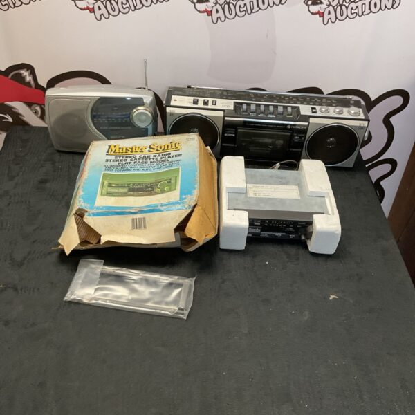 Lot of three vintage car radios, including Hitachi and Master Sonic.