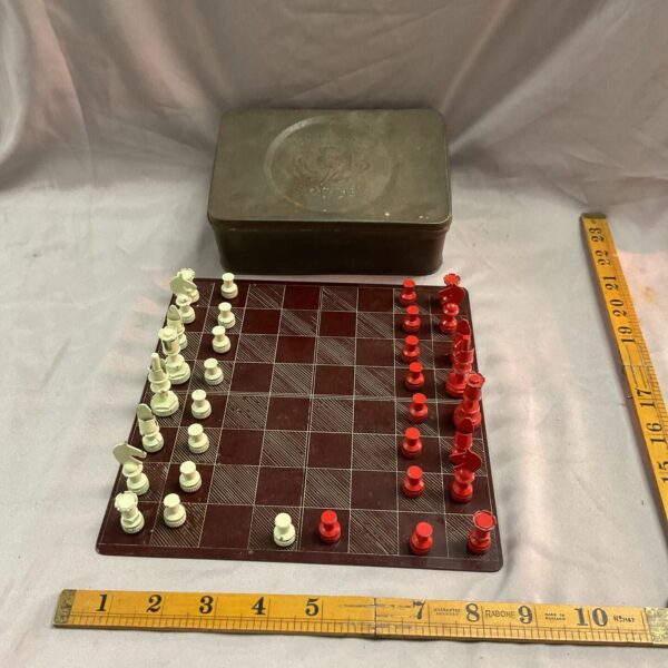 Vintage WWII Prisoner of War chess set with hand-carved pieces.