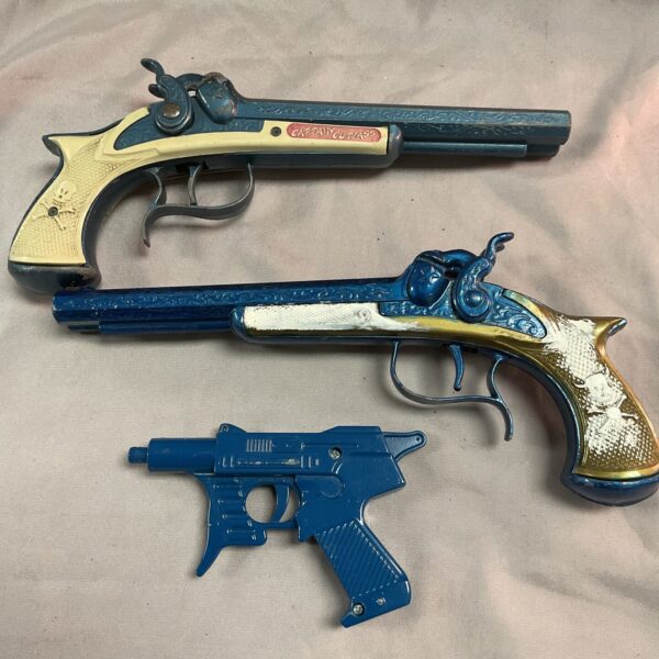 Vintage Lone Star pirate cap gun, diecast toy collectible.