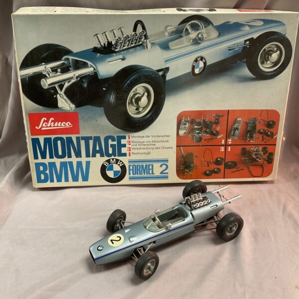Vintage Schuco Montage BMW F2 clockwork car with original box.