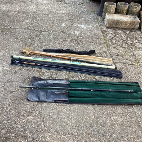 Selection of fishing rods including a Leeda pole and Silstar rod.