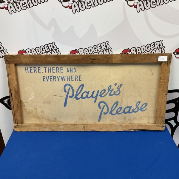 Vintage Players Cigarettes advertising board with "Here There and Everywhere" text.