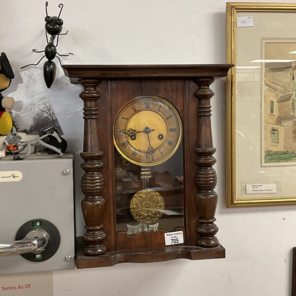Antique H A C American wall clock circa 1910 with wooden case.