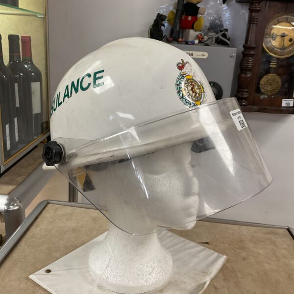 White ambulance paramedic helmet with visor for emergency services.