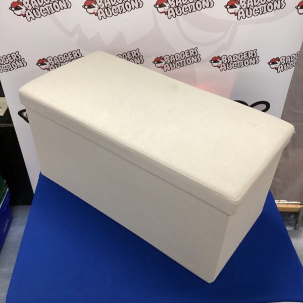 Collapsed folding fabric storage box for home organization.