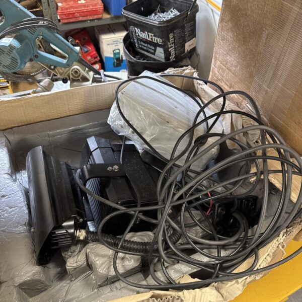 CCTV infrared camera lot with power supplies and packaging.