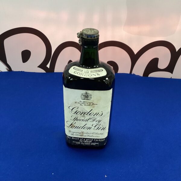 Vintage Gordons Gin bottle, collectible antique barware.