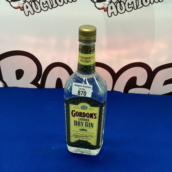 Vintage Gordons Dry Gin bottle, collectible barware and alcohol memorabilia.