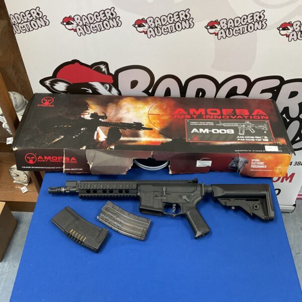 Amoeba AM-008 airsoft rifle with tactical features and polymer construction.