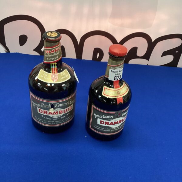 Vintage Drambuie liqueur bottles, collectible Scottish whisky liqueur.