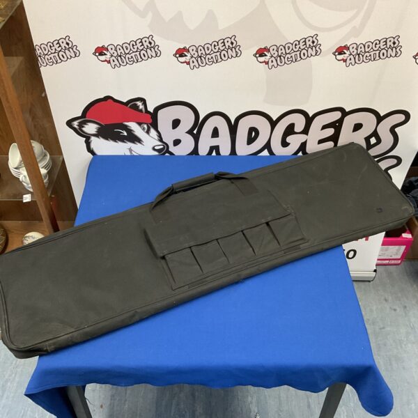 Large black rifle case for secure firearm transport.