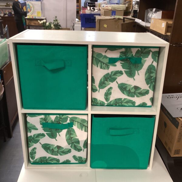 Green and white leaf patterned wooden storage box unit.