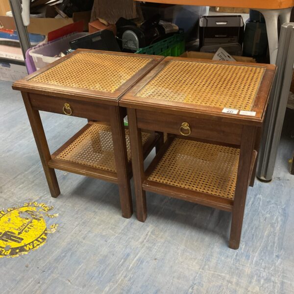 Pair of vintage mahogany bedside cabinets with rattan tops.