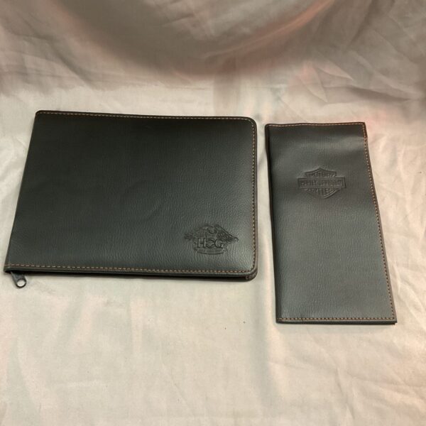 Black Harley Davidson HOG wallet with embossed logo.
