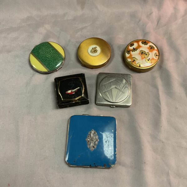 Group of six vintage powder compacts, antique makeup cases.