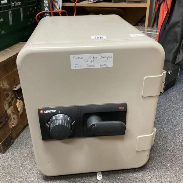 Vintage Sentry 1250 safe with combination code lock.