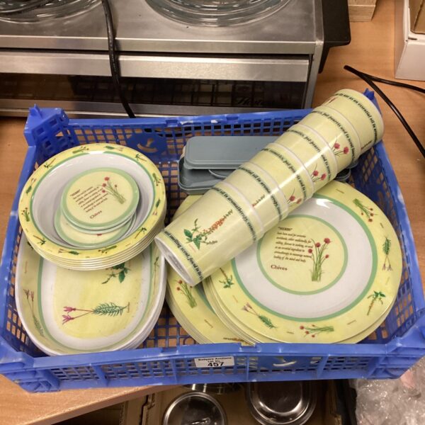 Colourful vintage melamine picnic set with floral design.