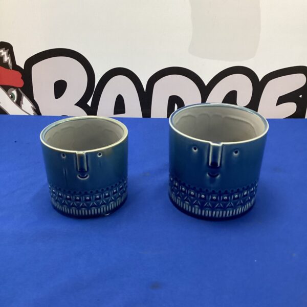 Two colourful Gisela Graham flower pots for plants.