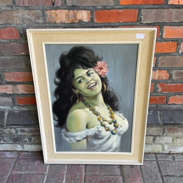 Vintage oil painting of a Spanish girl signed S nitasi.