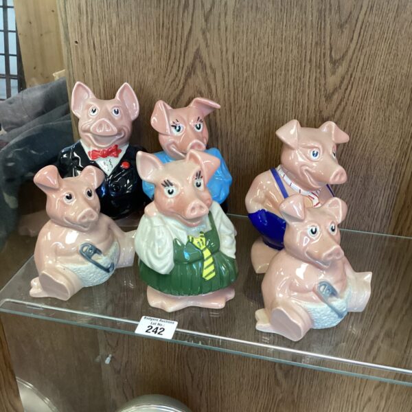 Set of four vintage Natwest piggy banks, collectible ceramic figures.