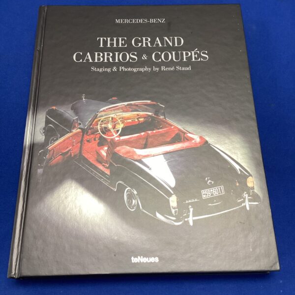 Mercedes-Benz book showcasing classic cabriolets and coupes.