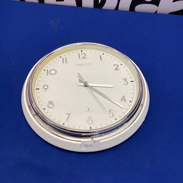 London Clock Company radio controlled wall clock with a white face.
