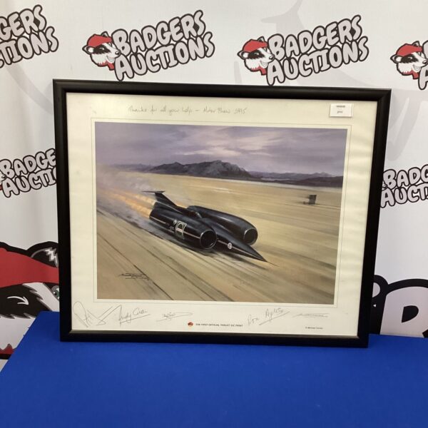 Framed signed print of Thrust SSC land speed record vehicle.