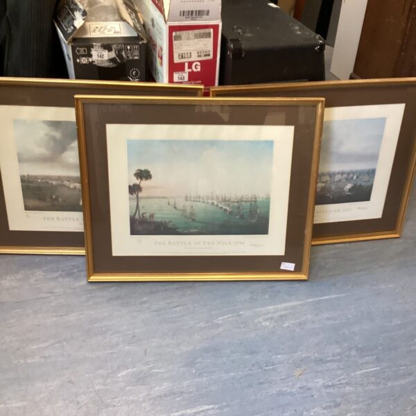 Framed print depicting a naval battle scene, Lord Nelson's Trafalgar.