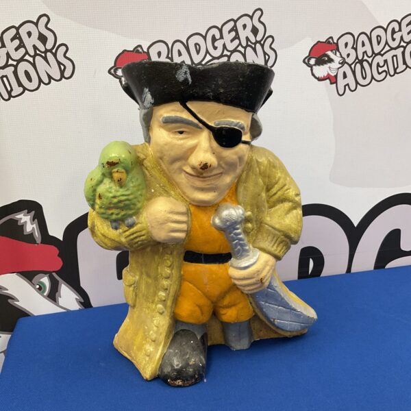 Vintage cast iron pirate doorstop for nautical home decor.