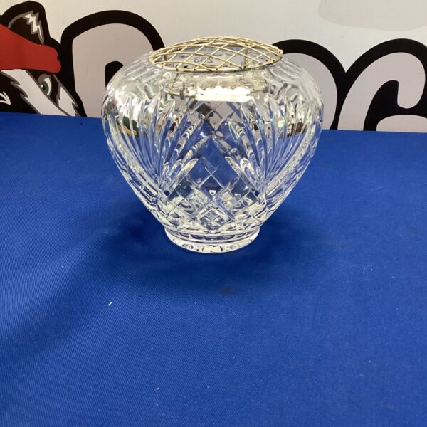 Intricate cut glass crystal flower bowl for elegant displays.