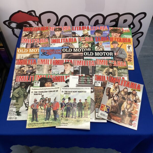 Vintage lot of militaria magazines for collectors.