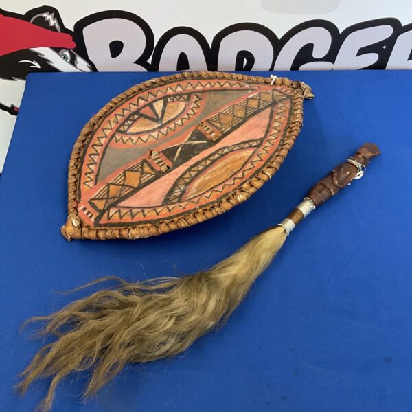 Traditional African hide shield and fly swatter set.