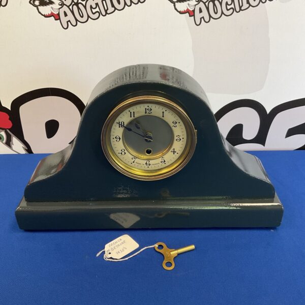 Vintage French De Bethune mantle clock with art deco styling.